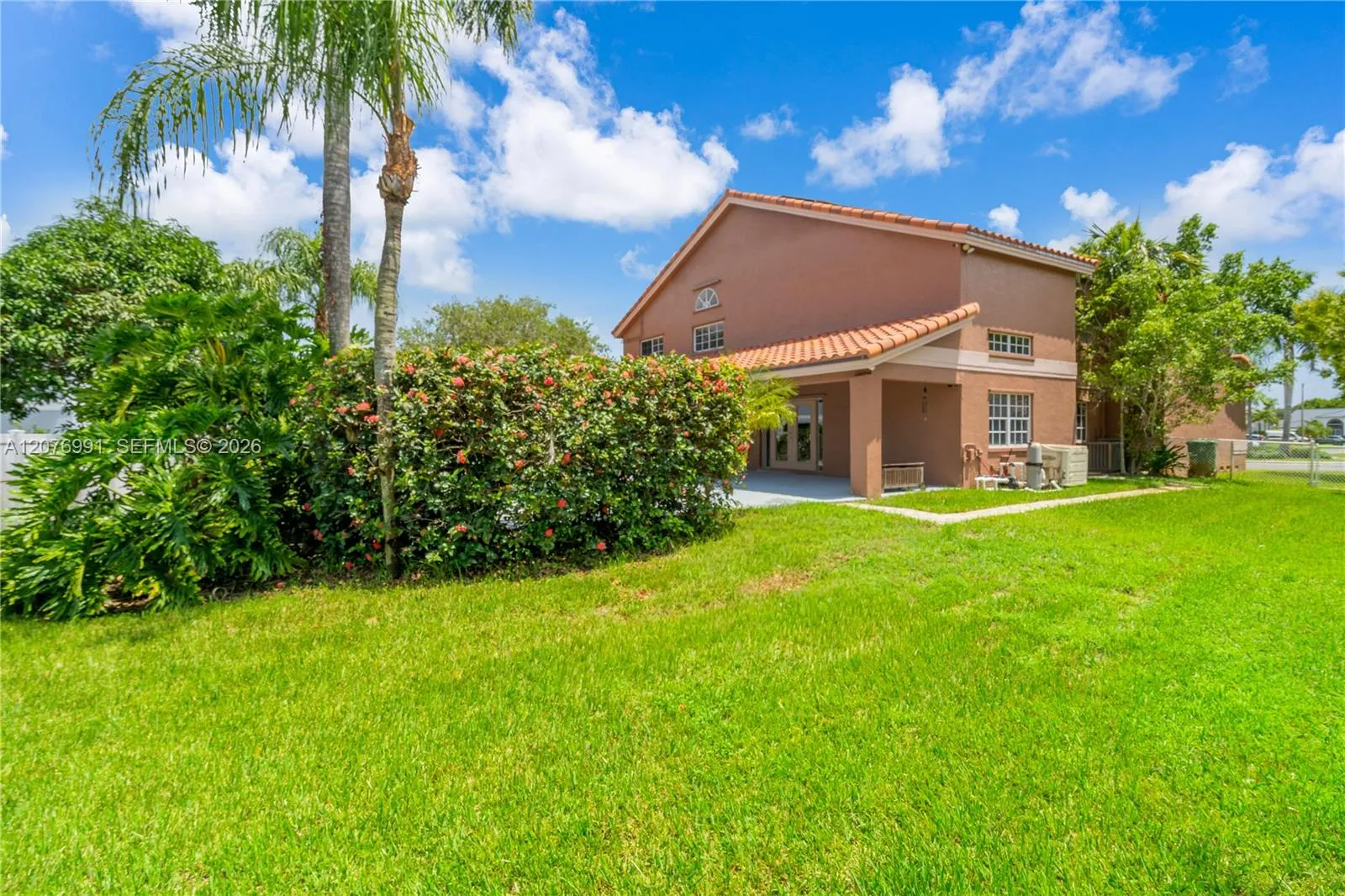 Large side yard, property is fenced