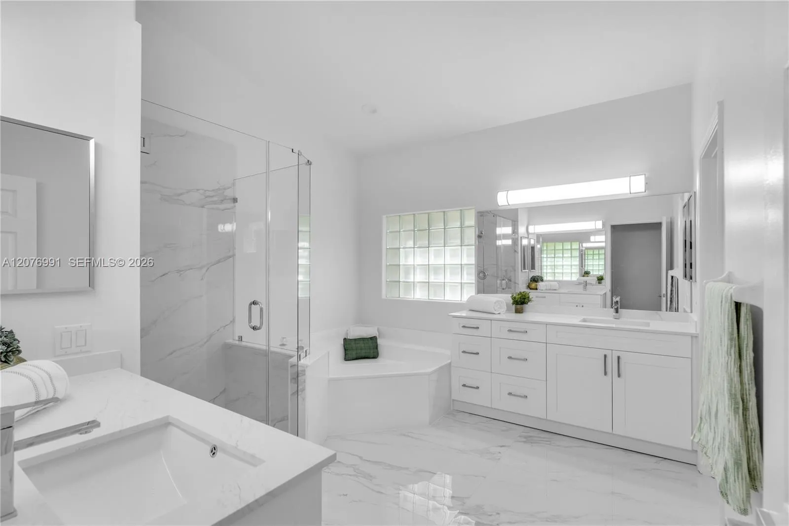 Recently upgraded with dual sink/vanities and private water closet