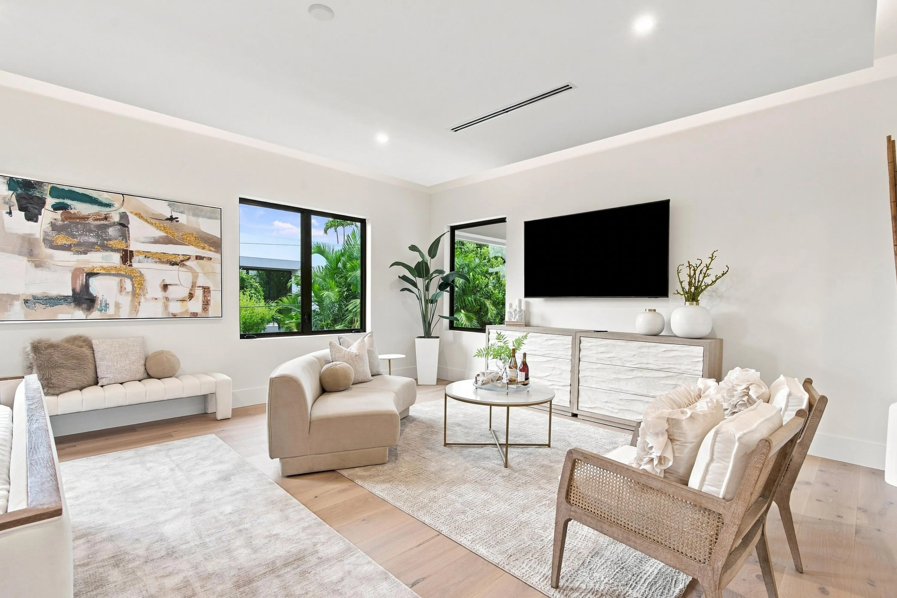 Recessed lighting, wood-finish flooring, and crown molding