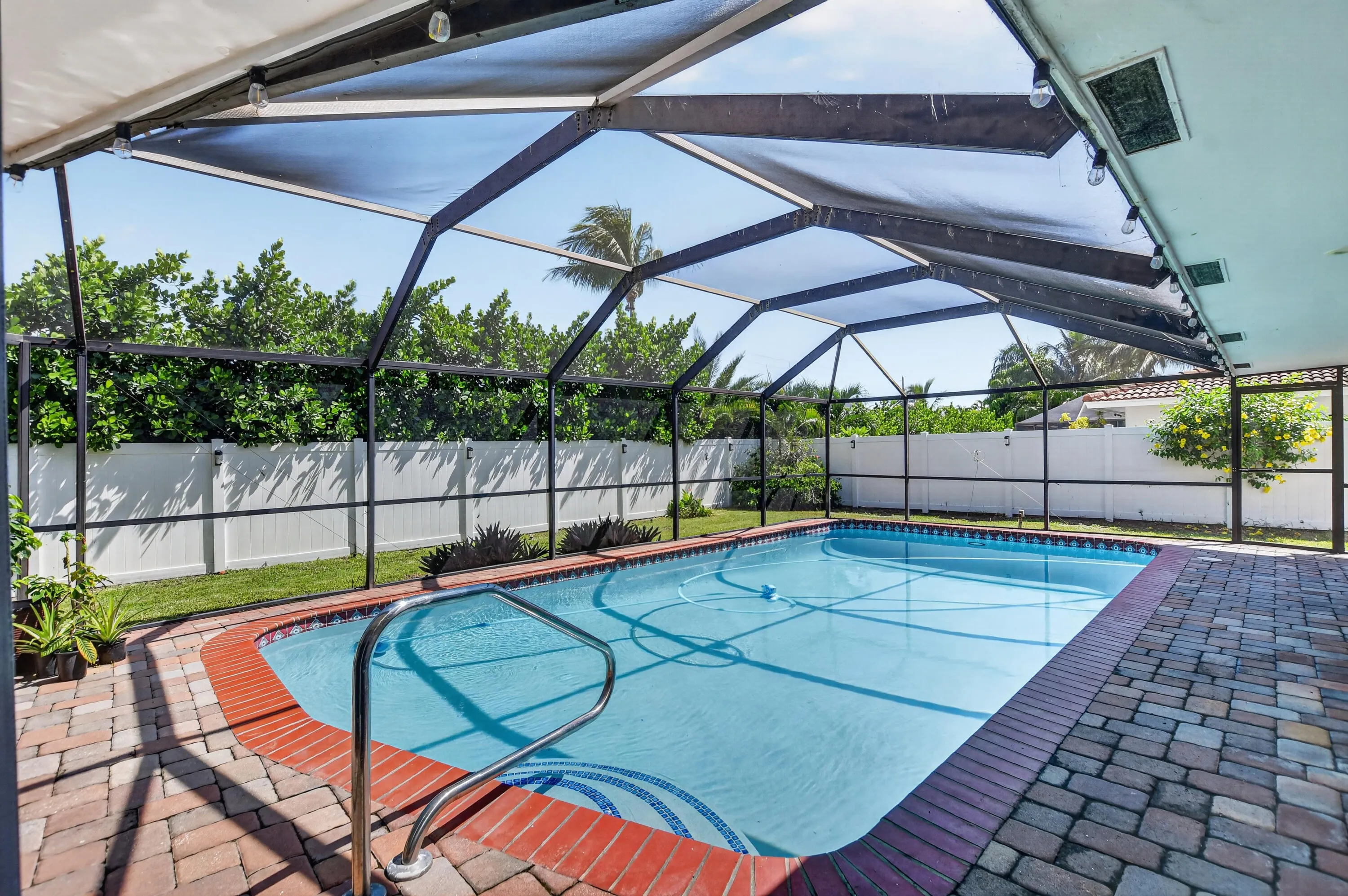Large pool with enclosed screen