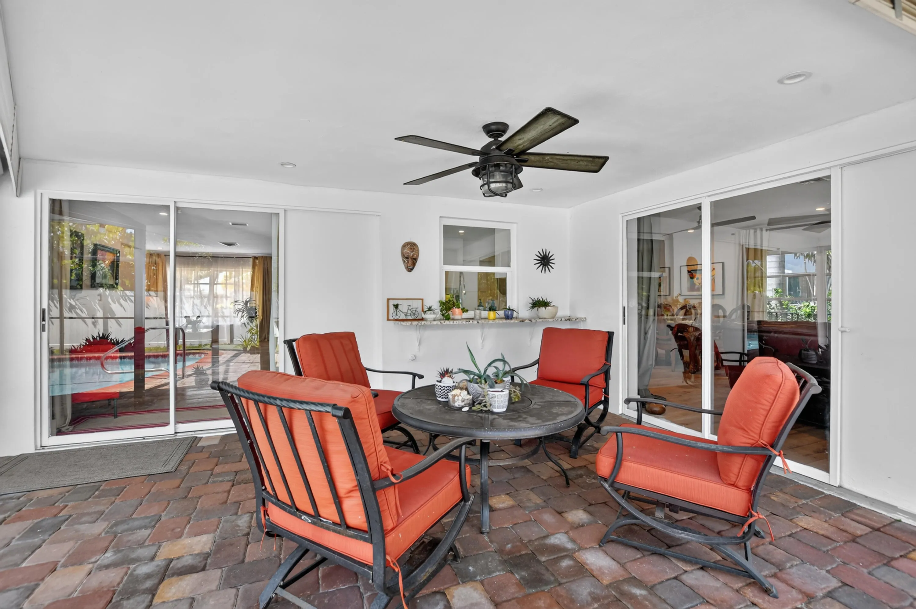 Covered patio with access to the kitchen and the dinning and entertainment area.