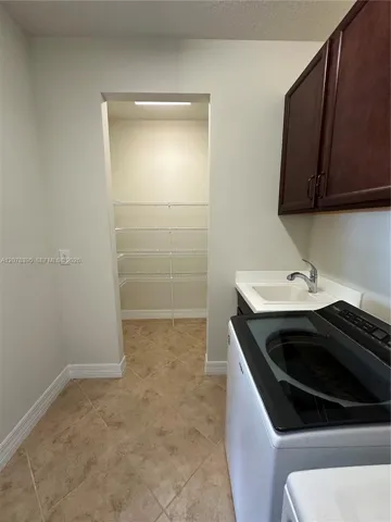 Spacious closet ideal for oversize pantry