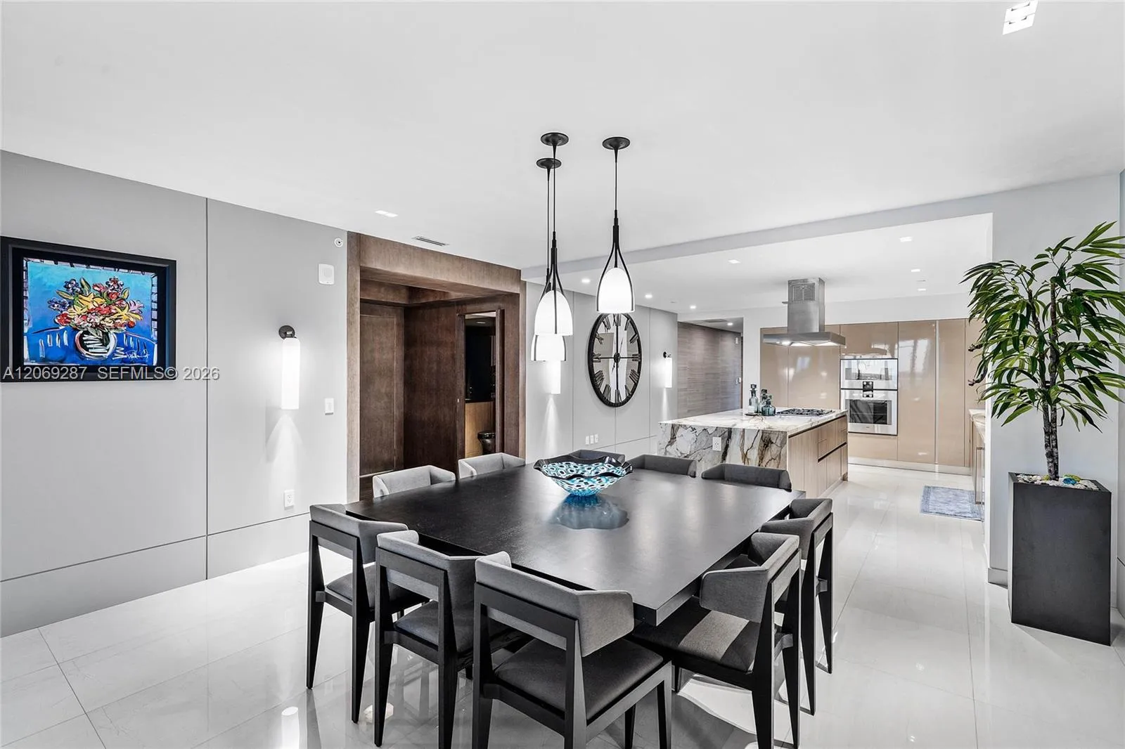 An elegant dining area and a seamless flow to the kitchen.