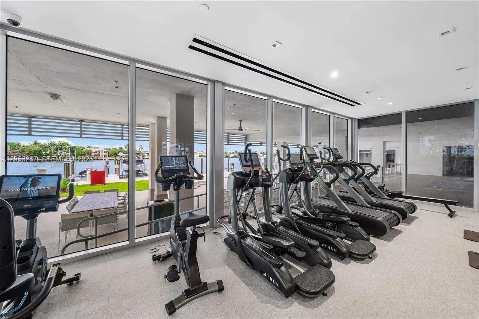 A private, state-of-the-art fitness center featuring premium equipment in an intimate setting.