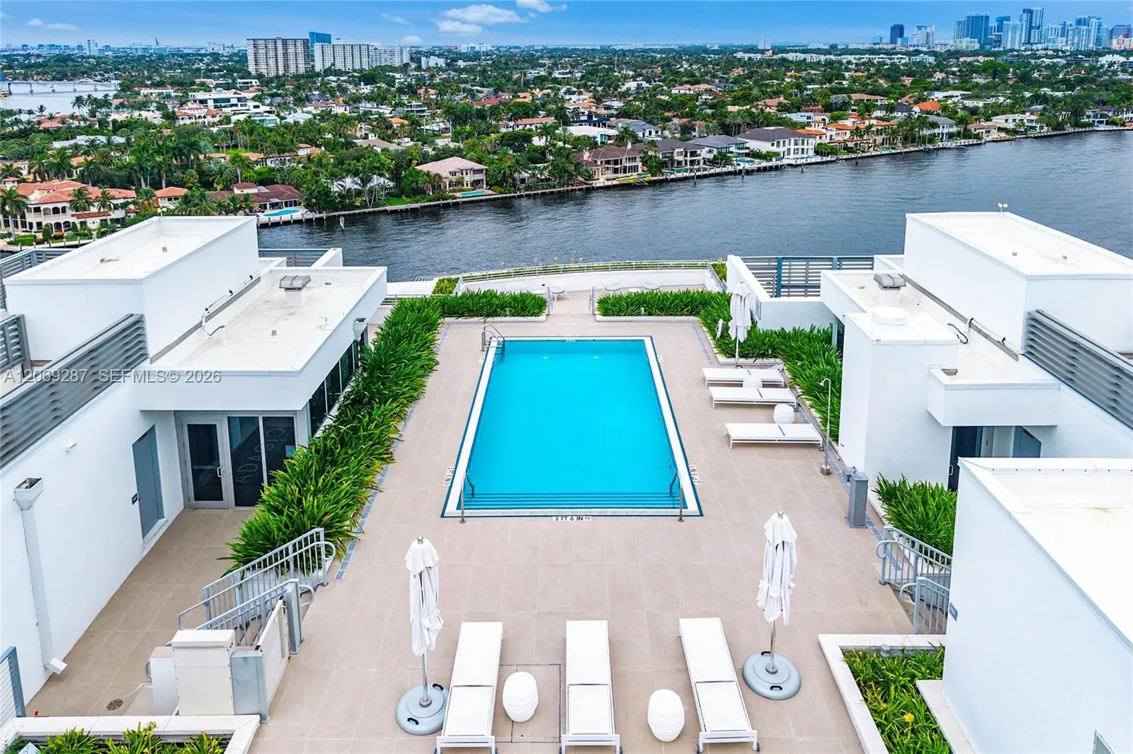 Roof Top resort-style rooftop pool overlooking the Intracoastal Waterway and Fort Lauderdale skyline.