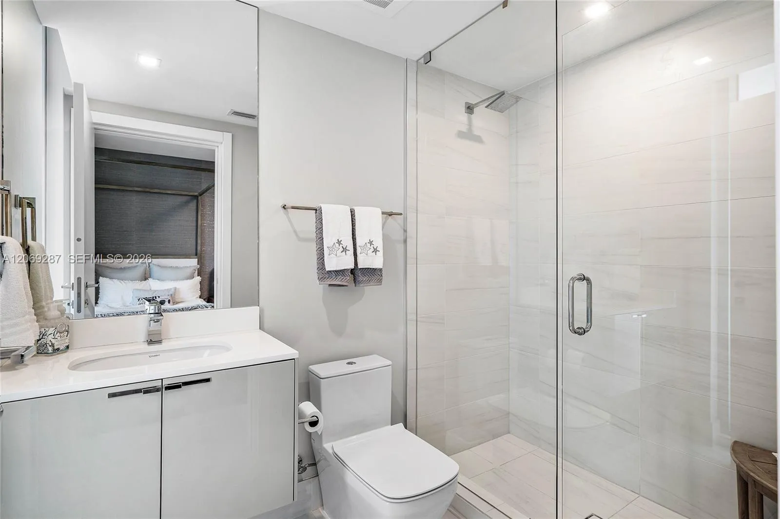 A well-appointed third bedroom with a private en-suite bathroom, providing comfort and privacy