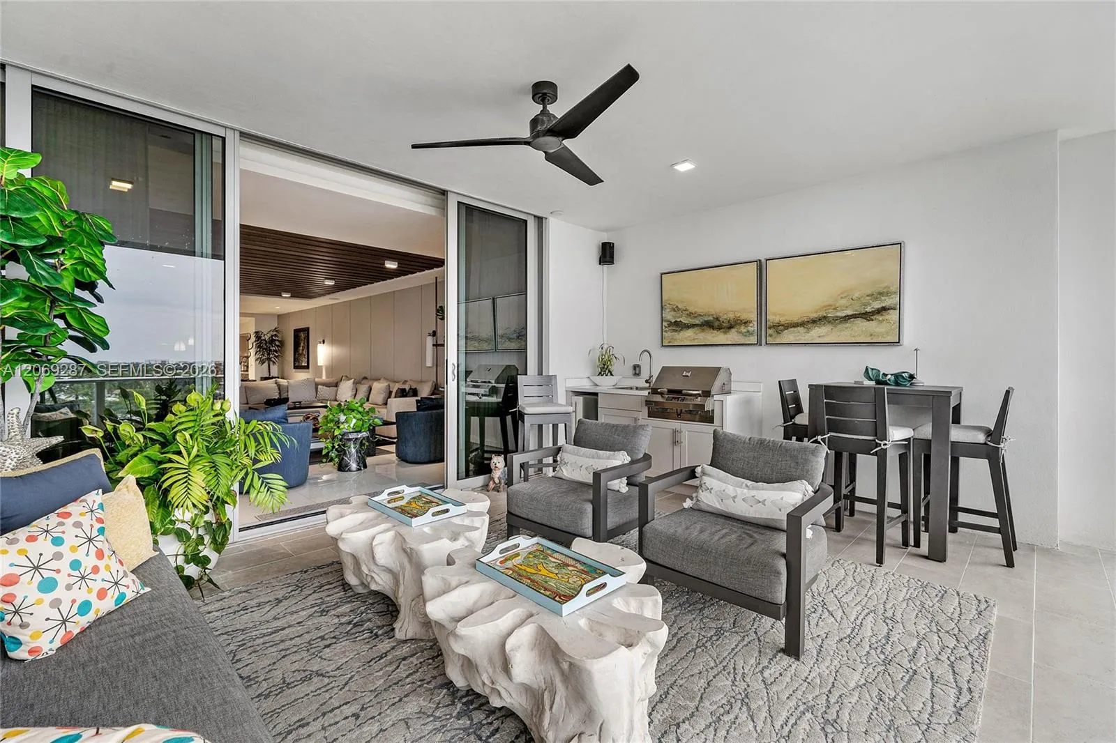 An expansive entertaining terrace with generous space for outdoor dining, lounging and enjoying the waterfront views.