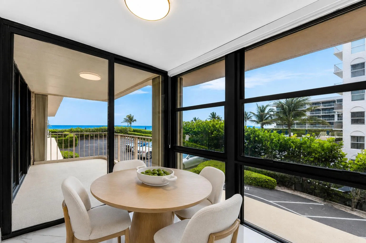 Floor-to-ceiling impact windows, direct ocean & Intracoastal water views. Virtually staged.