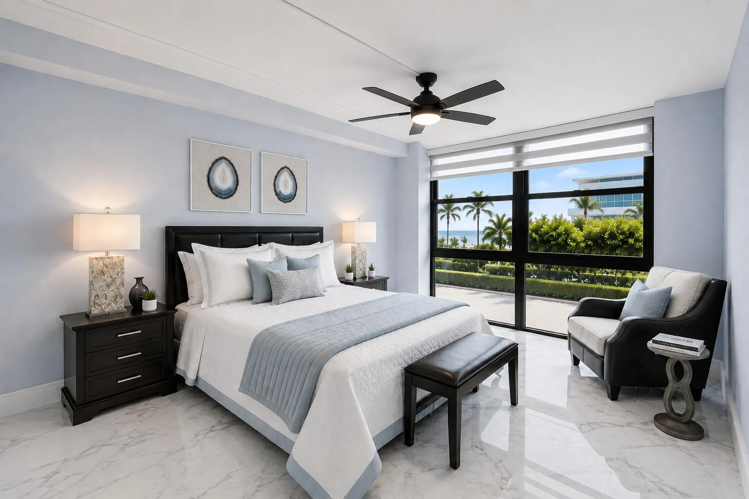 Expansive window wall, high ceilings, tile flooring and ensuite bathroom. Accessories virtually staged.