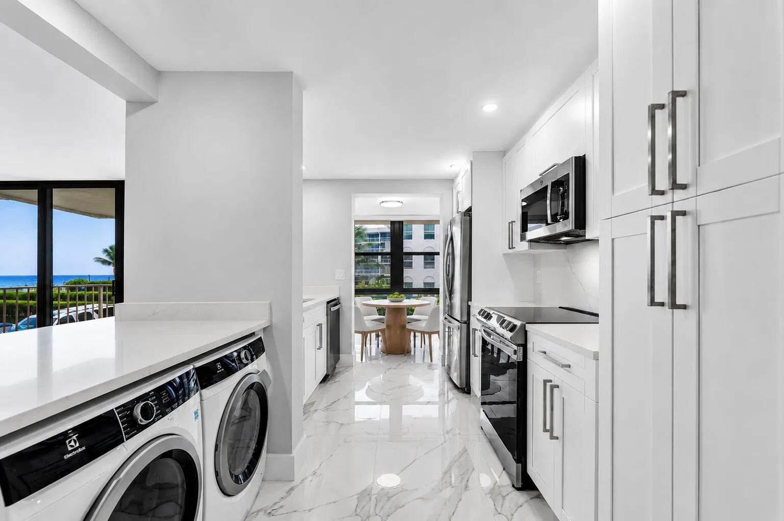 Washer & Dryer. Fully renovated with water views from all rooms. breakfast nook virtually staged