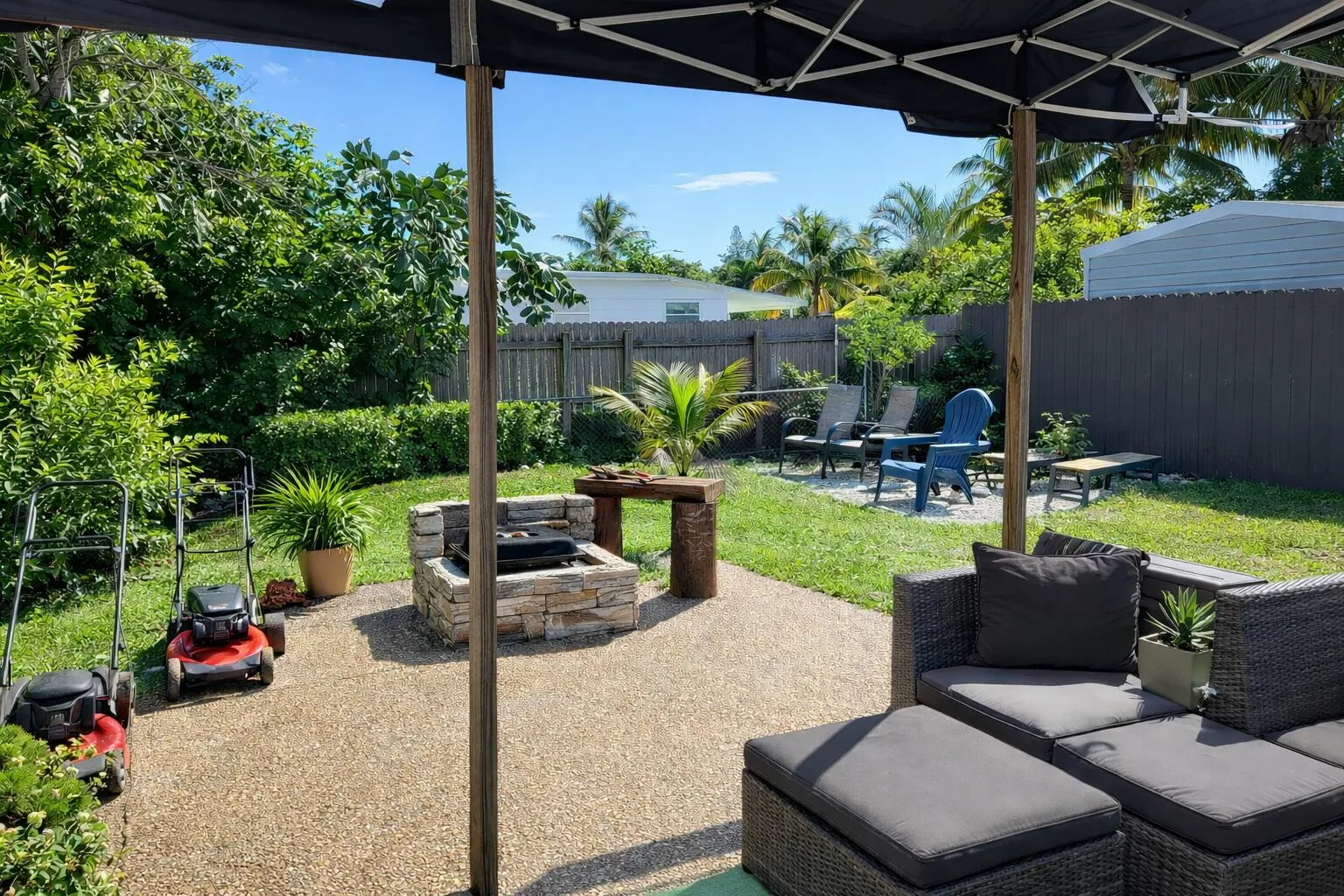 BACK YARD NO LONGER HAS COVERING BUT WILL BE COMPLETELY CLEARED PRIOR TO OCCUPANCY