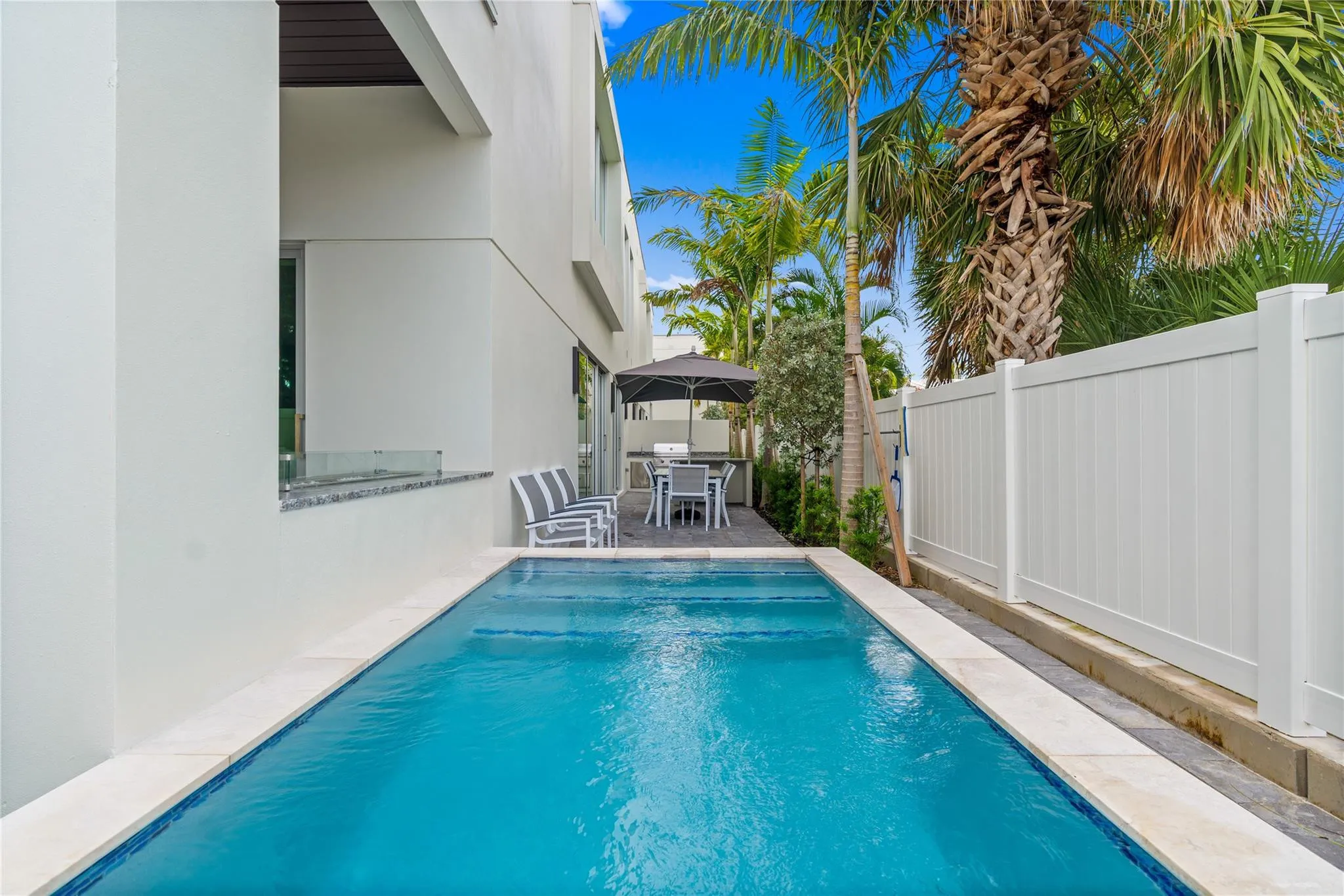 A remarkable luxury townhome rental that redefines upscale living in the heart of Lauderdale By The Sea. This beautifully designed 3,027 sq. ft residence features 4 spacious beds & 4.5 baths, making it perfect for families or those who love to entertain.The home also offers an outdoor kitchen and BBQ area, along with a private plunge pool that invites relaxation and fun. For boating enthusiasts, a boat slip is also available for rent. Easy access to a plethora of amenities, beach, dining, & entertainment.