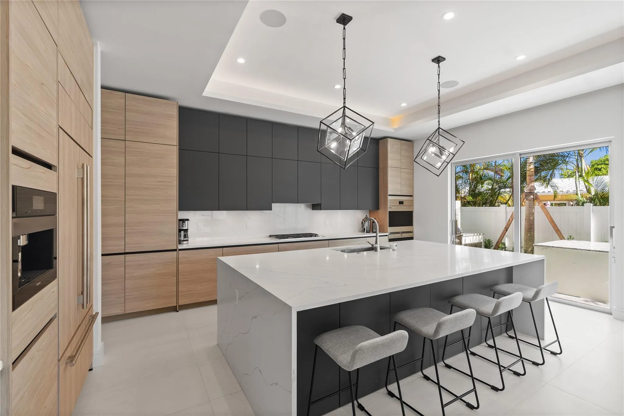A remarkable luxury townhome rental that redefines upscale living in the heart of Lauderdale By The Sea. This beautifully designed 3,027 sq. ft residence features 4 spacious beds & 4.5 baths, making it perfect for families or those who love to entertain.The home also offers an outdoor kitchen and BBQ area, along with a private plunge pool that invites relaxation and fun. For boating enthusiasts, a boat slip is also available for rent. Easy access to a plethora of amenities, beach, dining, & entertainment.