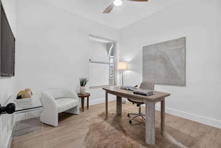 Wood-finish flooring, recessed lighting, and a ceiling fan