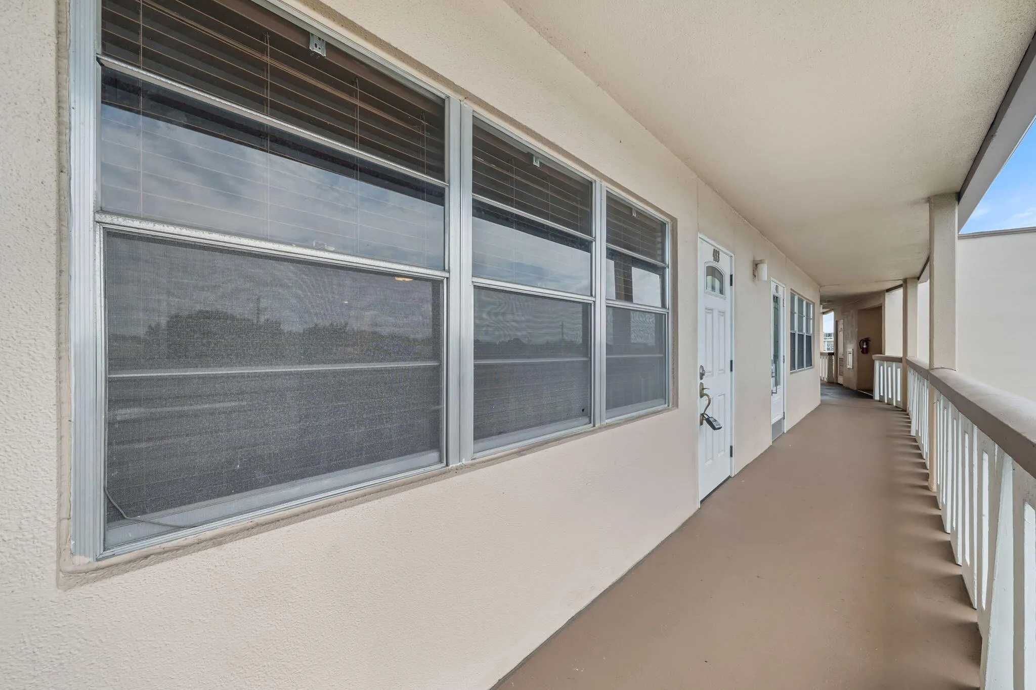 Open-air walkway to the front entrance