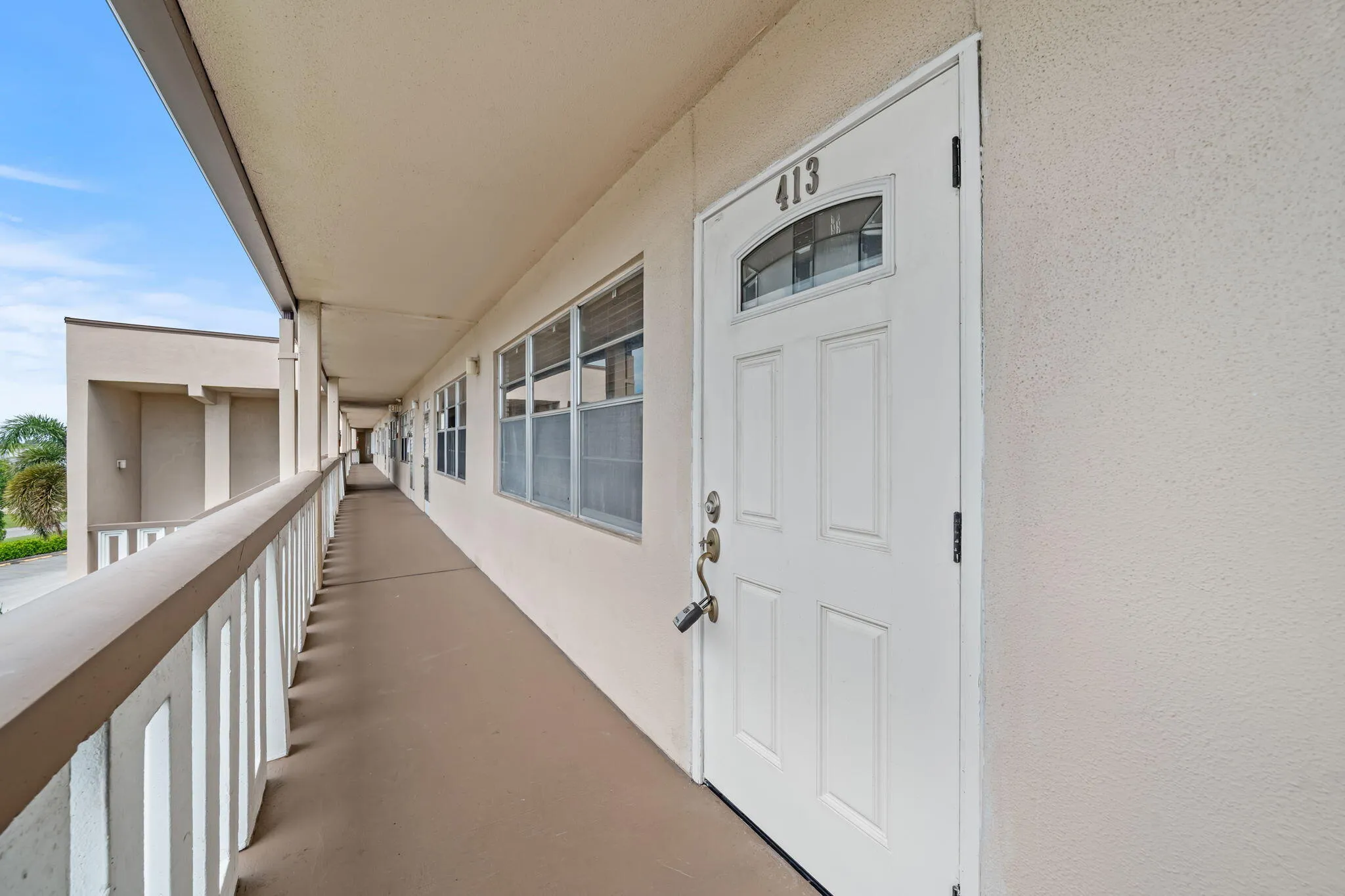 Open-air walkway to the front entrance