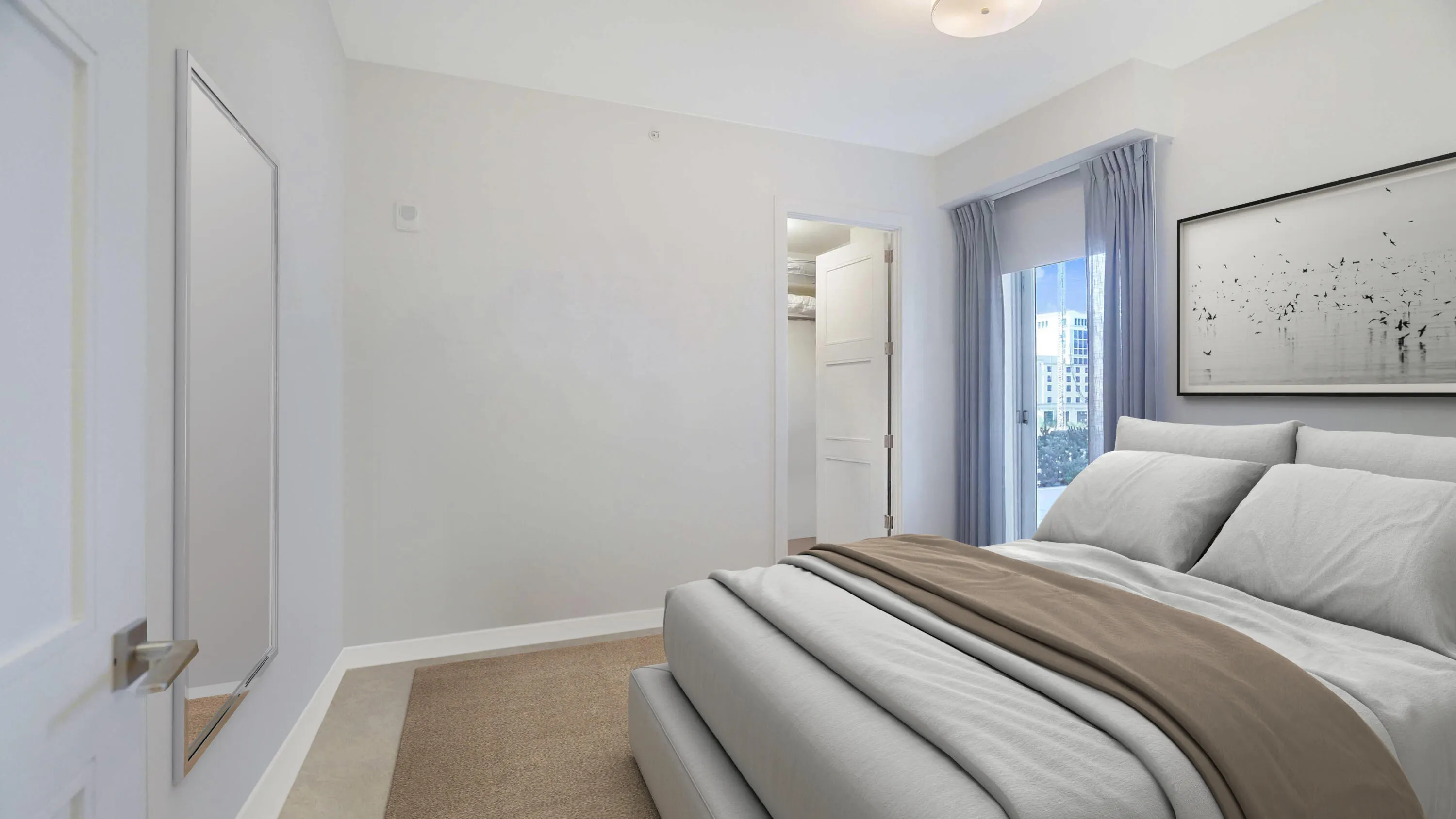 Guest suite with a dedicated workspace and direct access to the residence’s outdoor living. VIRTUALLY STAGED.