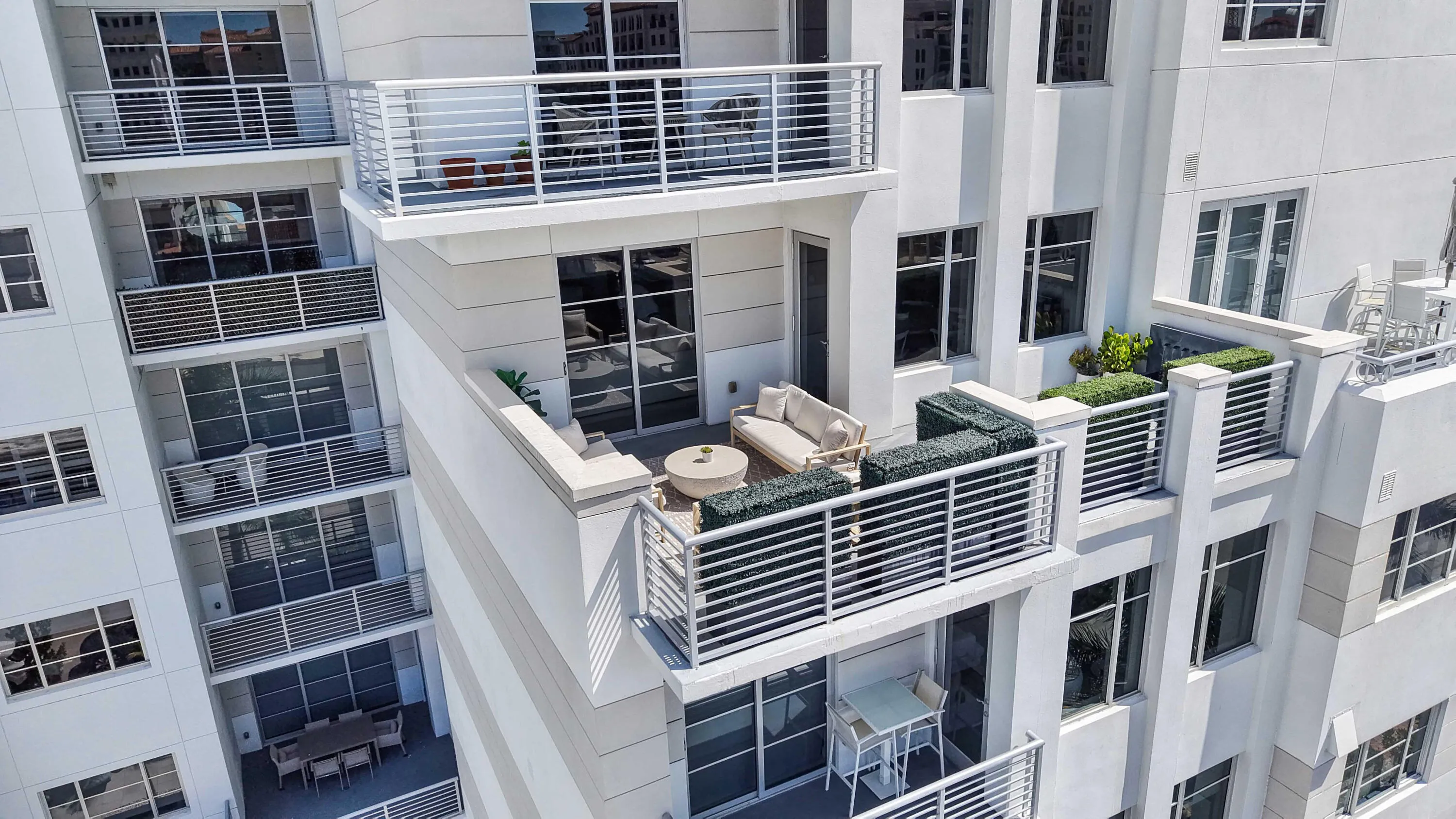 Residence 601 at Tower 155 is distinguished by approximately 428 square feet of outdoor living across two private spaces. VIRTUALLY ADJUSTED.