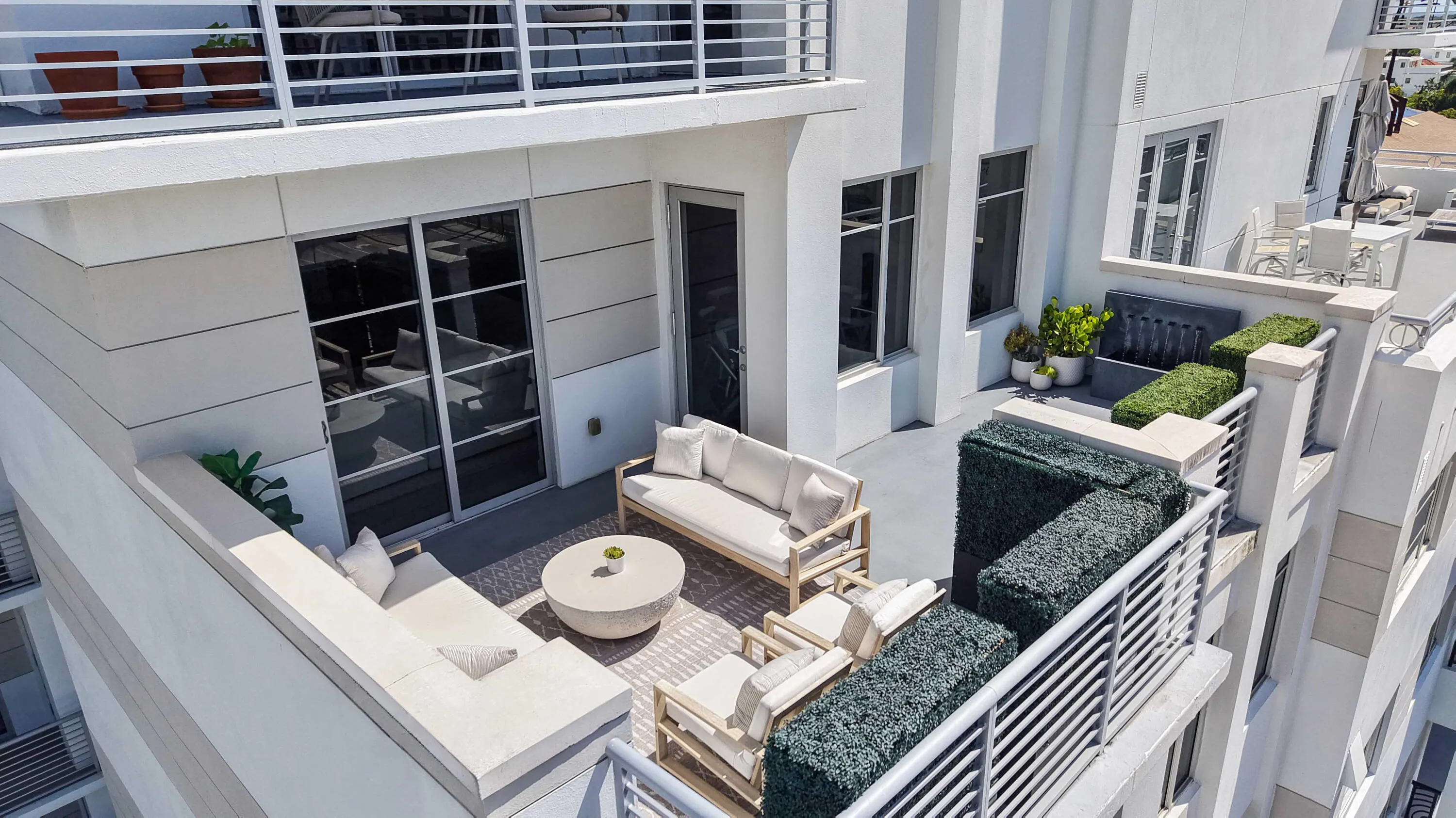 The oversized south-facing terrace connects directly to the main living space at Residence 601. VIRTUALLY ADJUSTED.