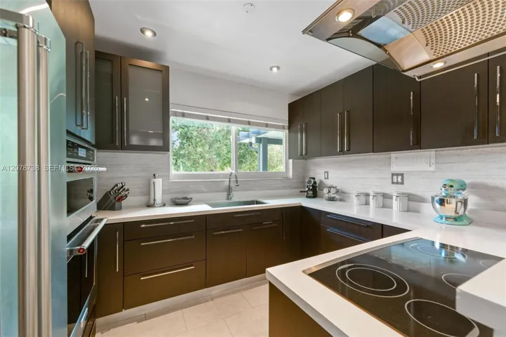 It’s contemporary, functional and designed so the person cooking never feels removed from everything happening around them.