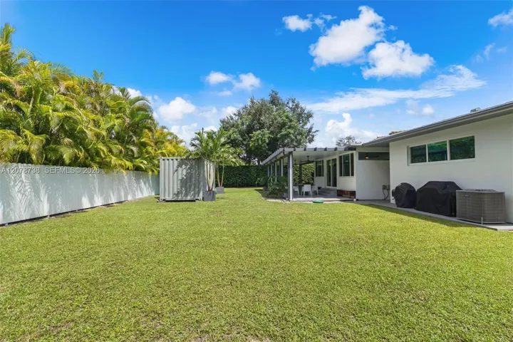 An expansive backyard with endless possibilities for play, entertaining, and relaxing.