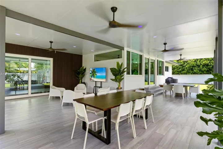 A covered terrace designed for long lunches, easy evenings, and everyday Florida living.