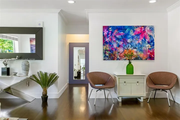 Natural light, rich wood floors and clean white walls create an effortless backdrop for everyday living.