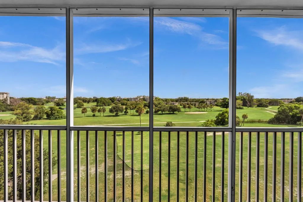 Screened in patio overlooking the golf course