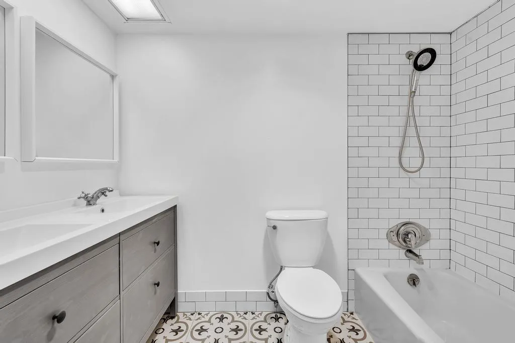 Renovated Guest Bathroom with Shower/Tub Combo