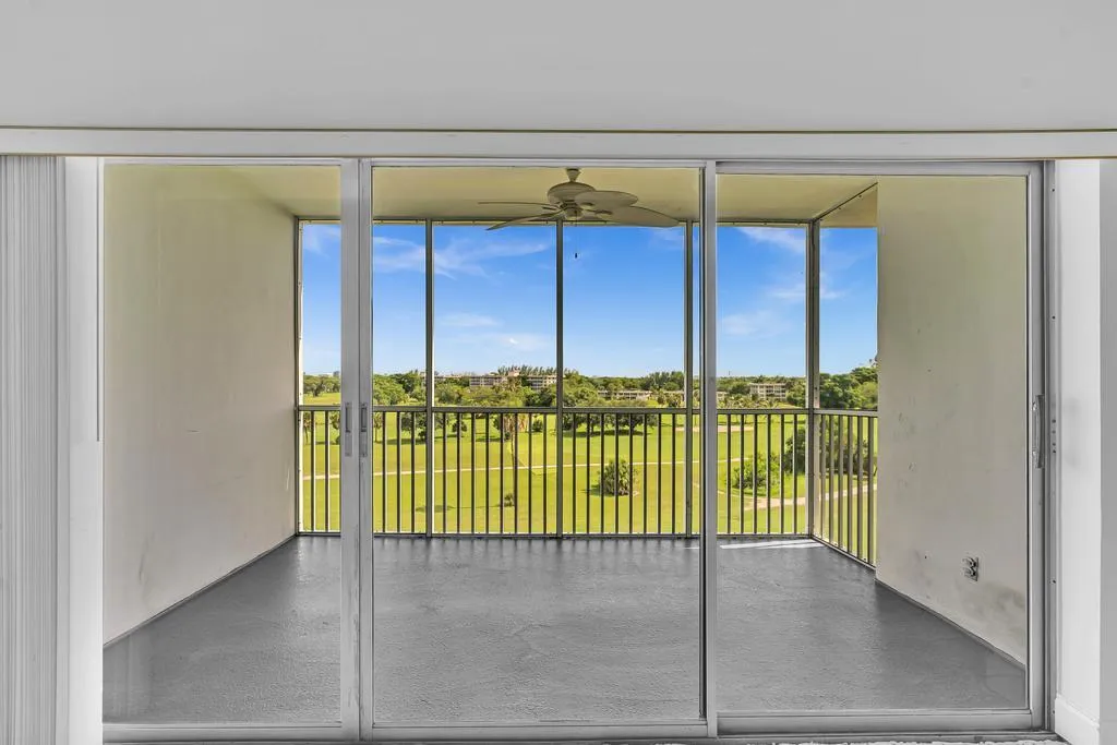 Screened in patio overlooking the golf course