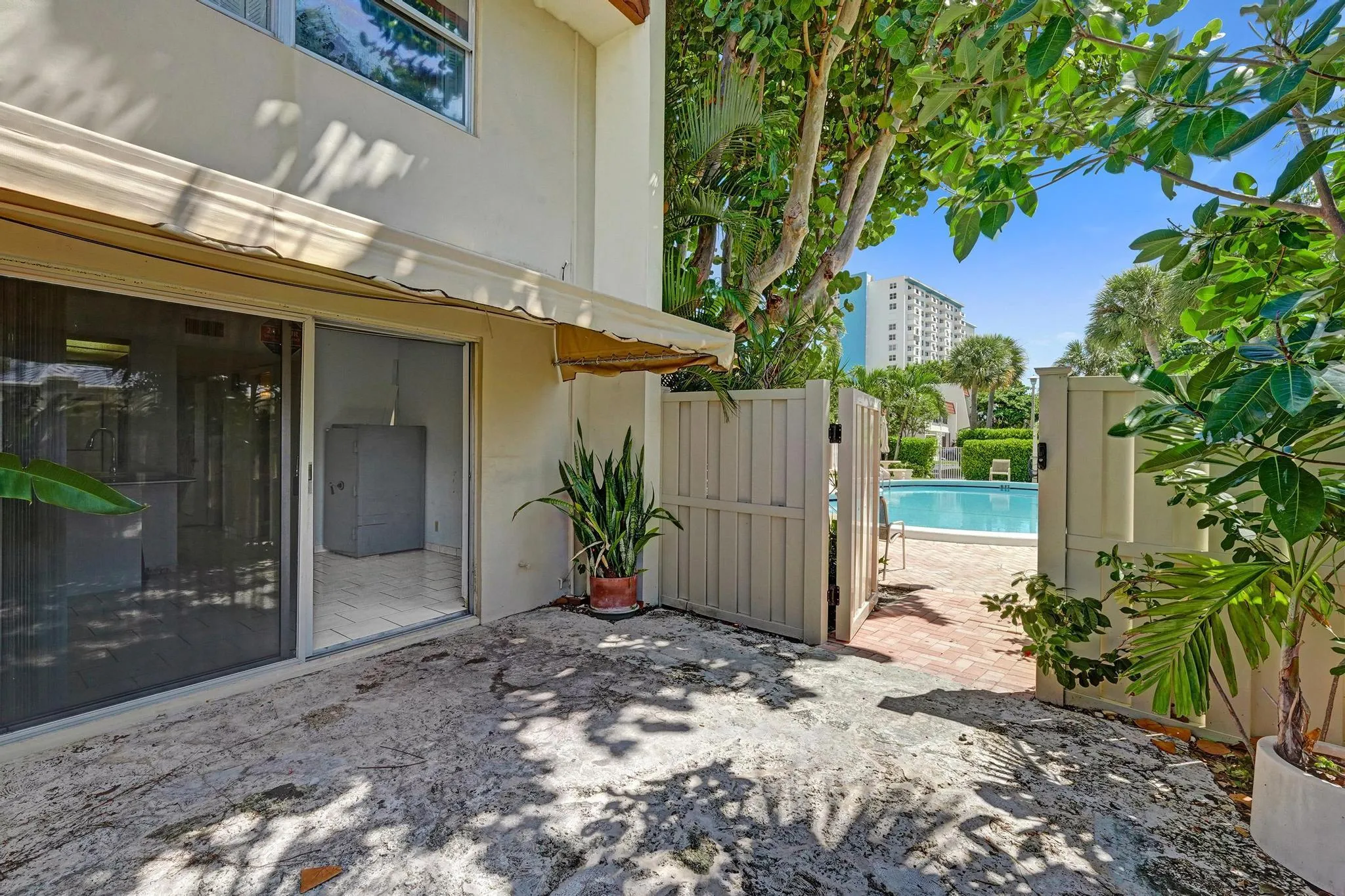 Private entrance to the pool from south facing fenced patio