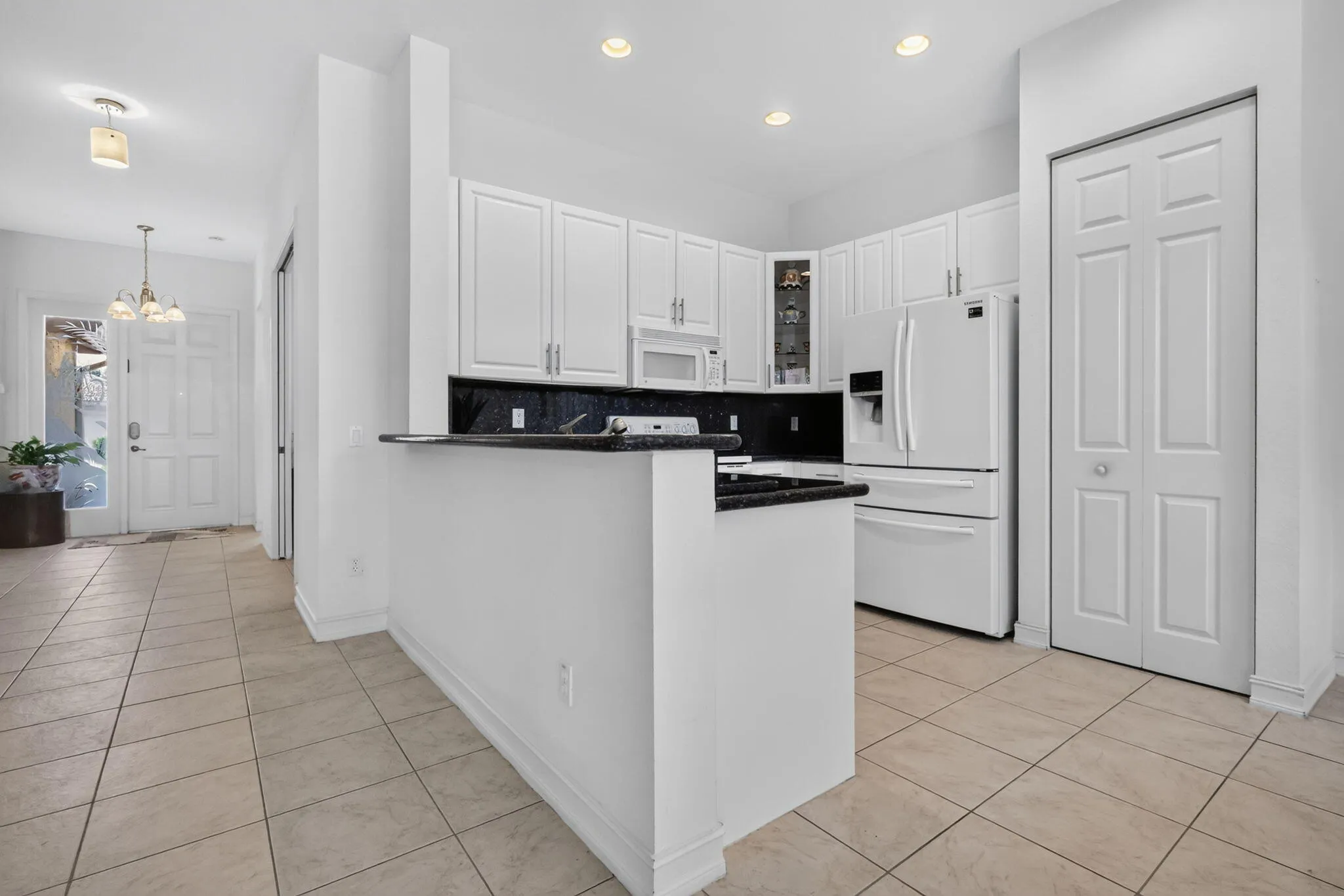 This kitchen was designed to part of the conversation, flowing naturally into the dining & great-room areas.