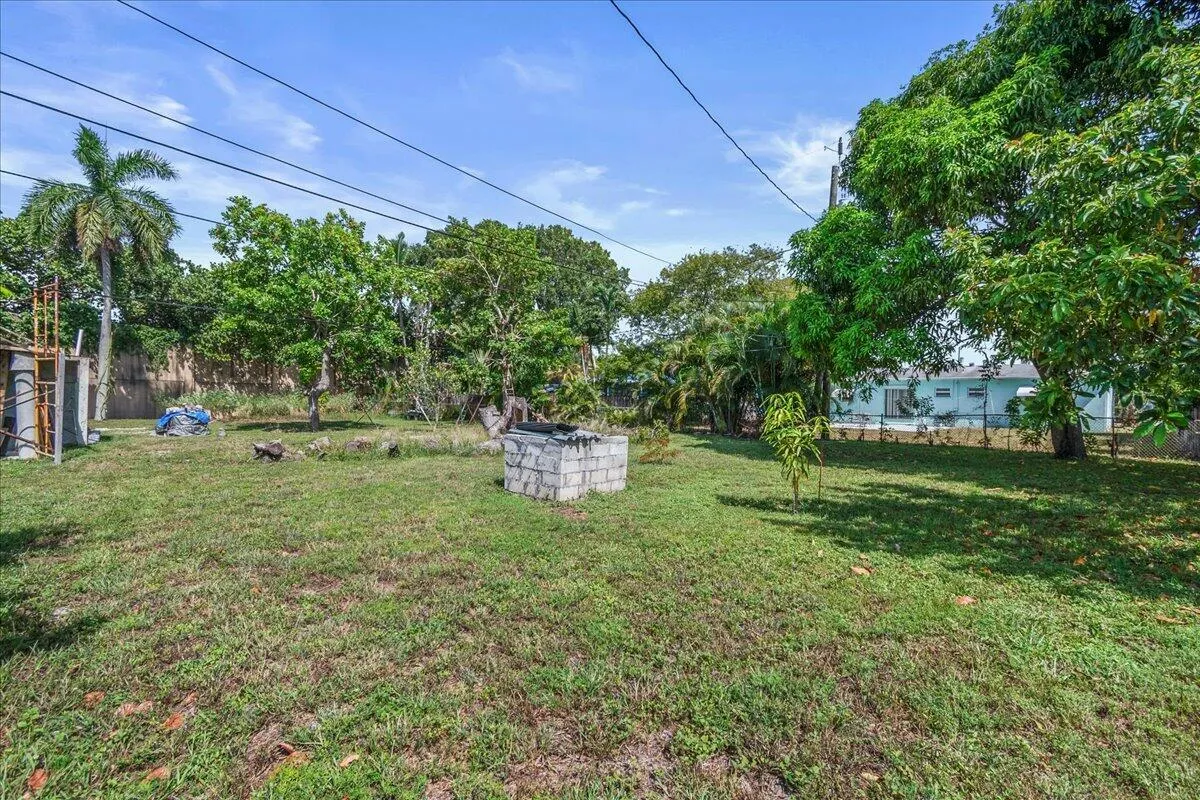 East view of the property with fruit tre