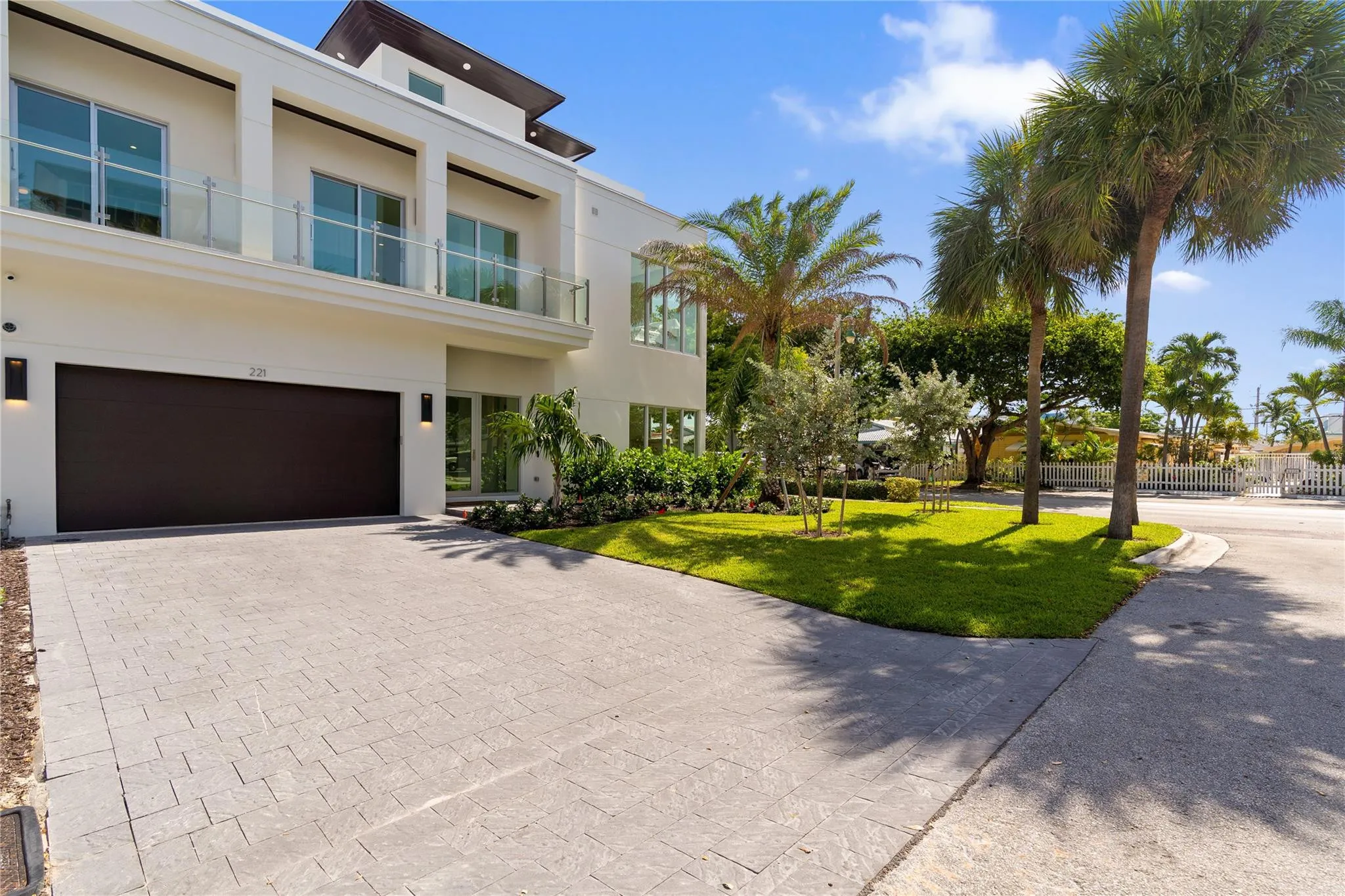 Front View - A remarkable luxury townhome rental that redefines upscale living in the heart of Lauderdale By The Sea. This beautifully designed 3,027 sq. ft residence features 4 spacious beds & 4.5 baths, making it perfect for families or those who love to entertain.The home also offers an outdoor kitchen and BBQ area, along with a private plunge pool that invites relaxation and fun. For boating enthusiasts, a boat slip is also available for rent. Easy access to a plethora of amenities, beach, dining, & entertainment.