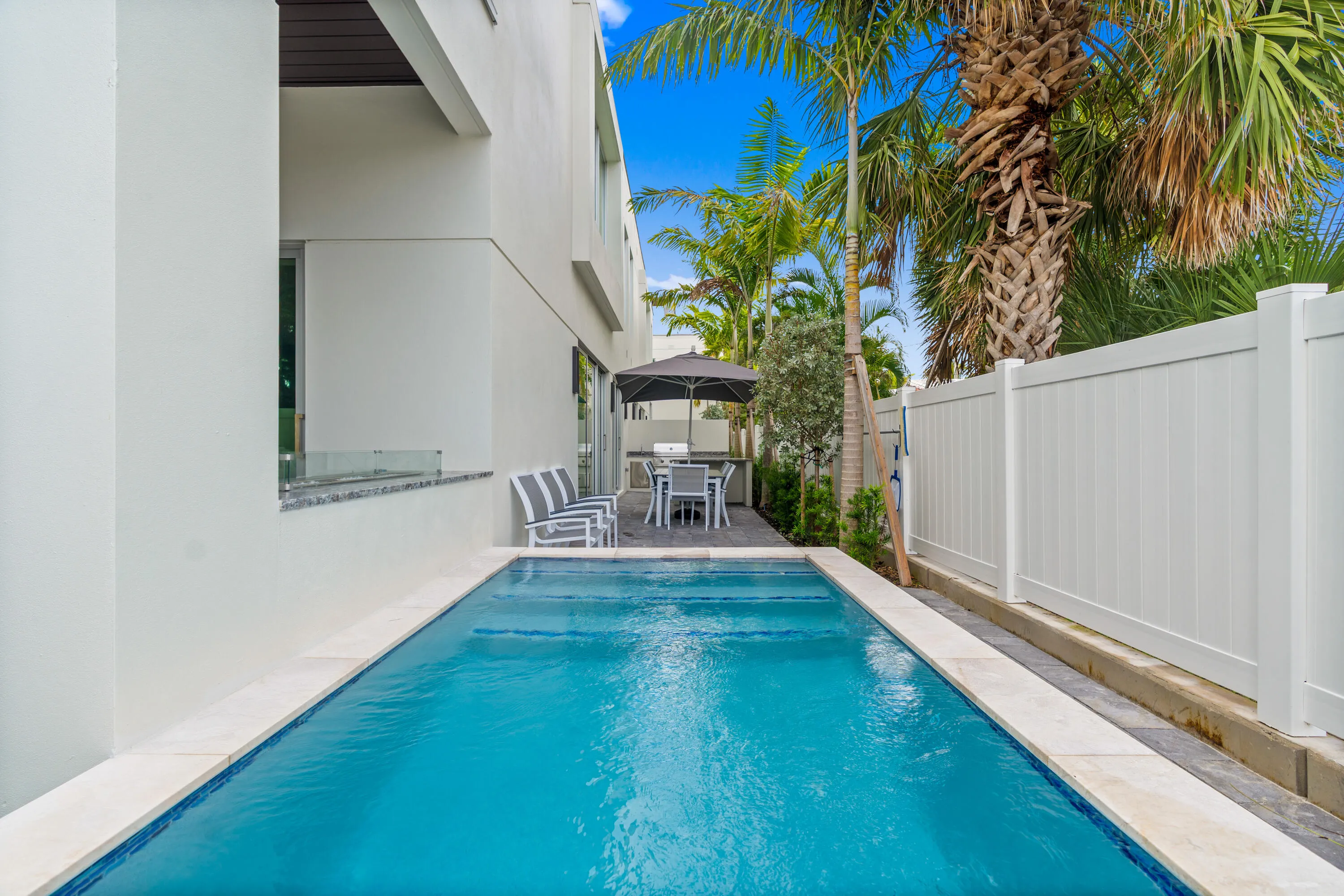 Private Plunge Pool - A remarkable luxury townhome rental that redefines upscale living in the heart of Lauderdale By The Sea. This beautifully designed 3,027 sq. ft residence features 4 spacious beds & 4.5 baths, making it perfect for families or those who love to entertain.The home also offers an outdoor kitchen and BBQ area, along with a private plunge pool that invites relaxation and fun. For boating enthusiasts, a boat slip is also available for rent. Easy access to a plethora of amenities, beach, dining, & entertainment.