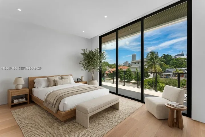 Guest Bedroom. Disclaimer: Several photographs presented in this listing contain digitally added furniture, artwork, and decor. These virtually staged images are intended solely for illustrative purposes.