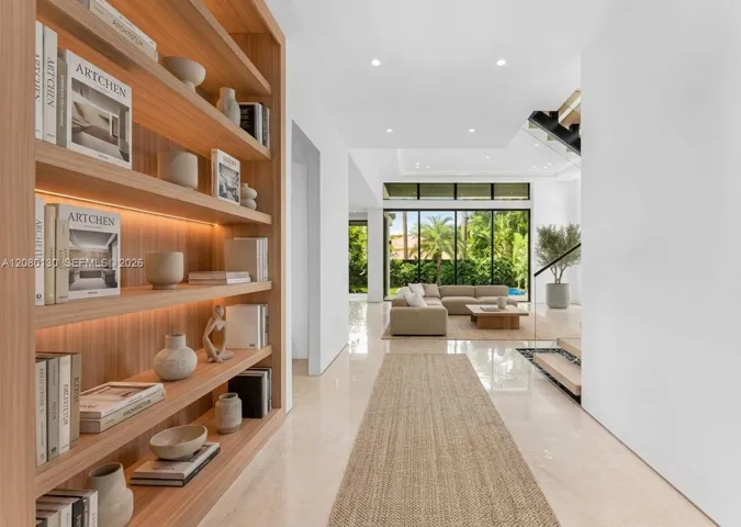 Entry. Disclaimer: Several photographs presented in this listing contain digitally added furniture, artwork, and decor. These virtually staged images are intended solely for illustrative purposes.