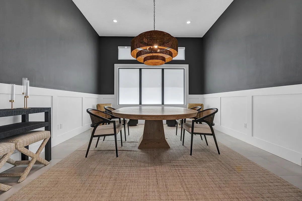 Dining area featuring a contemporary woven pendant light fixture