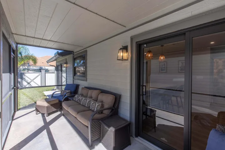 Screened patio with fenced yard