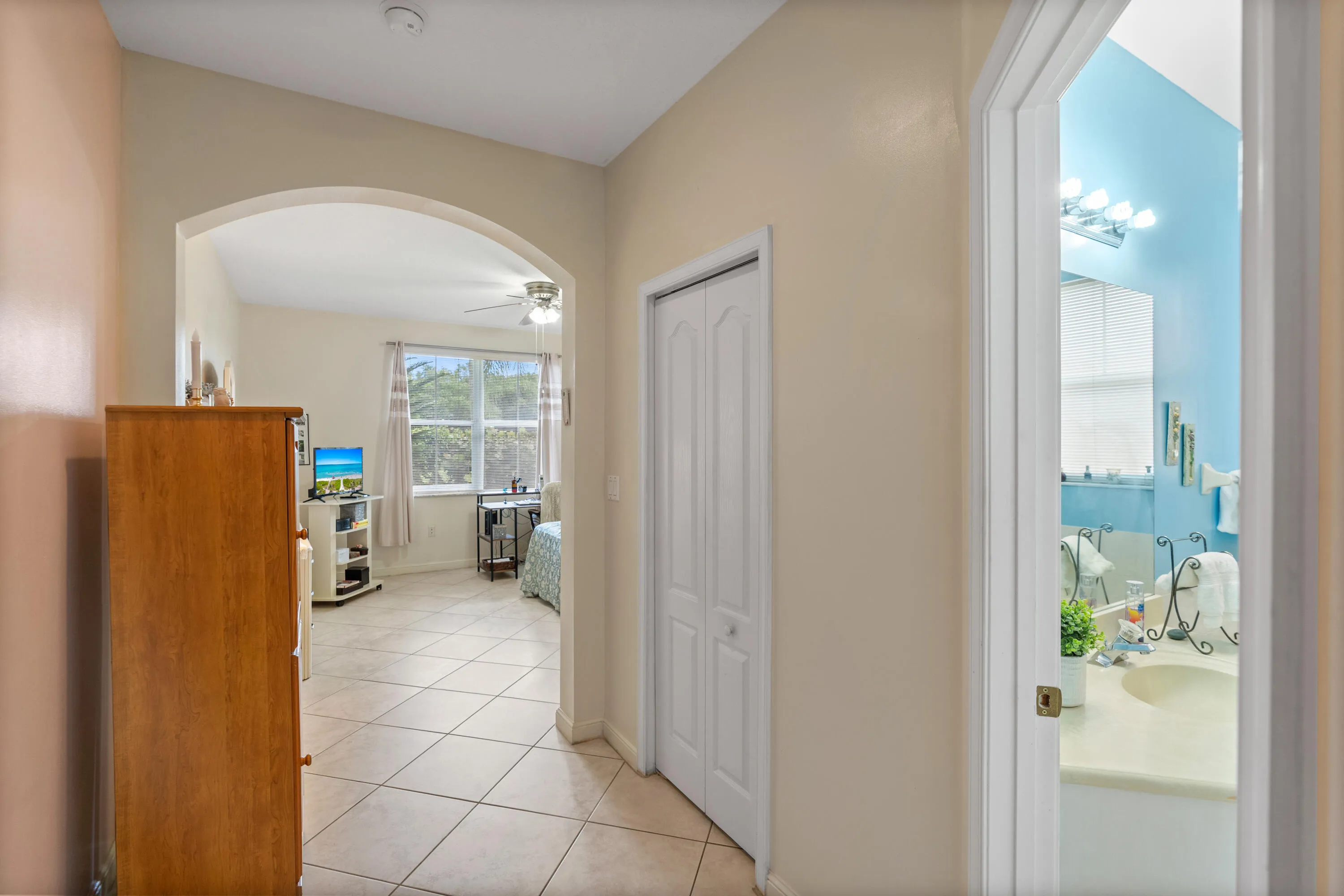 Virtually staged primary bathroom to show neutral paint color.