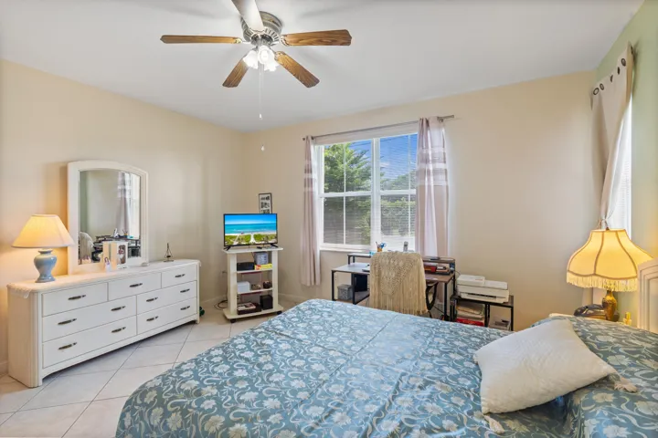 Generously Sized Primary Bedroom with Room for a Sitting or Work Area