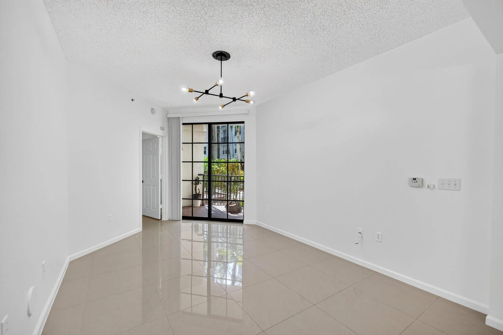 2 living with view of balcony