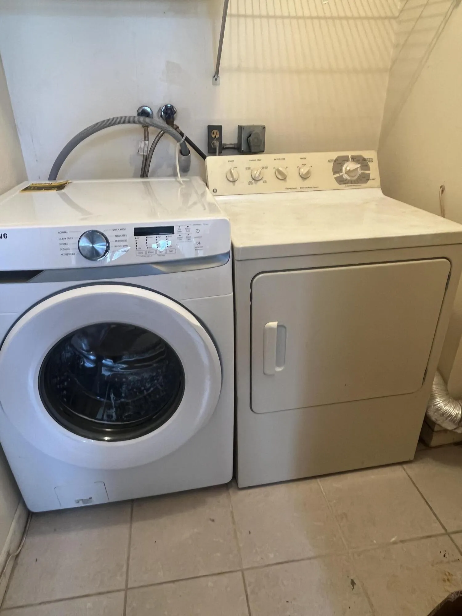 full side by side washer/dryer out in the utility closet off of the patio
