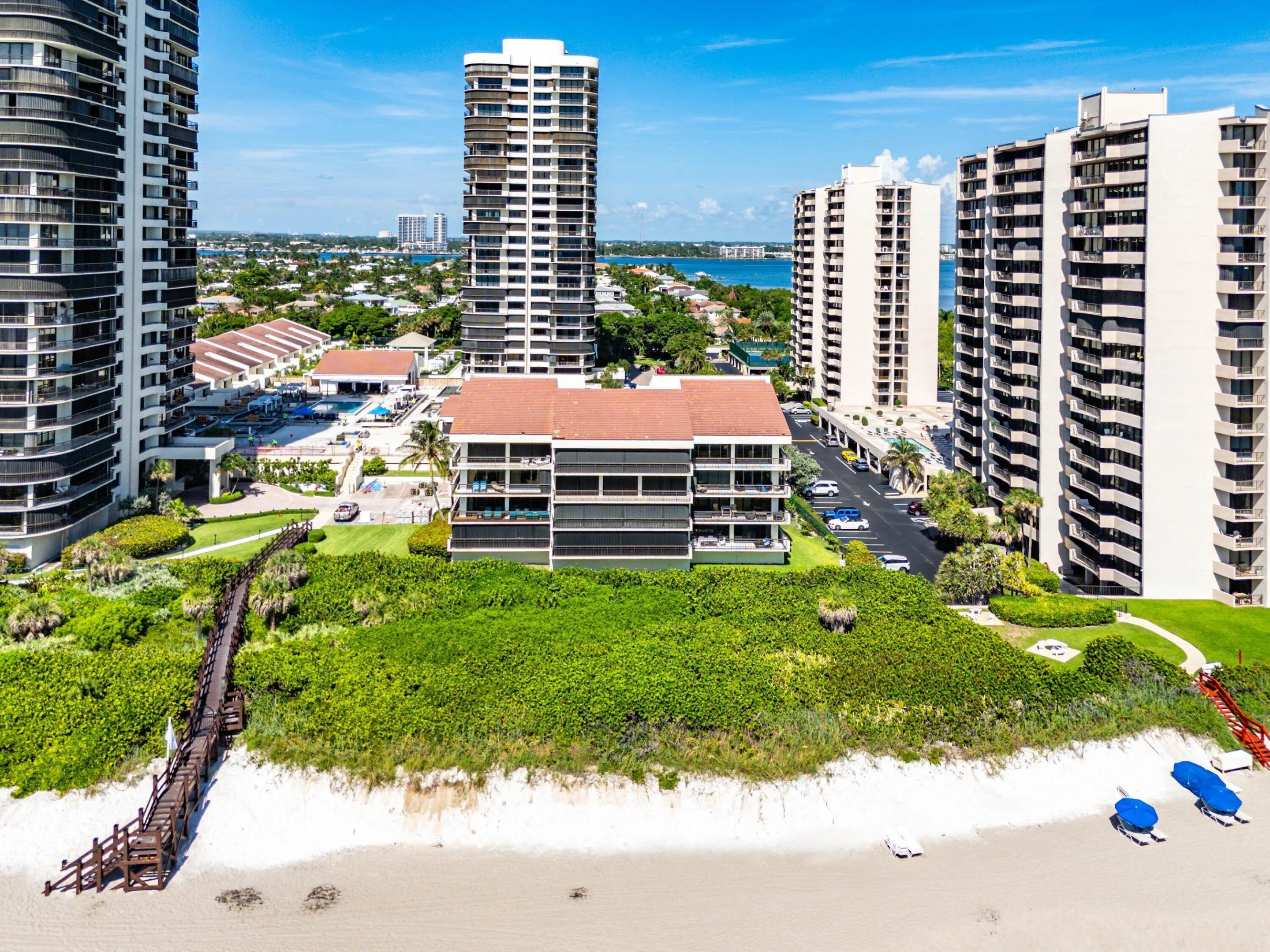 The Ocean House sits directly along the dune line creating a low-rise beachfront alternative to traditional tower living.
