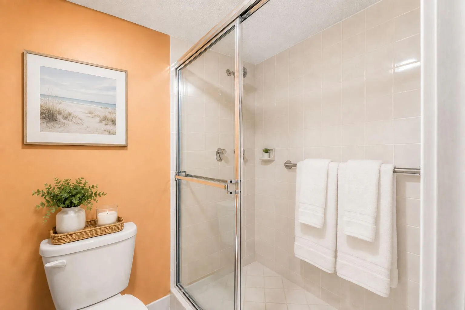 Guest bathroom features a tub/shower combination, generous vanity space and a convenient layout adjoining the guest suite.
