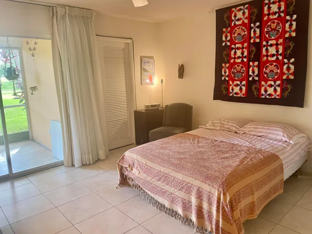 Primary Bedroom with Sliding Glass Doors & Large Walk In Closet