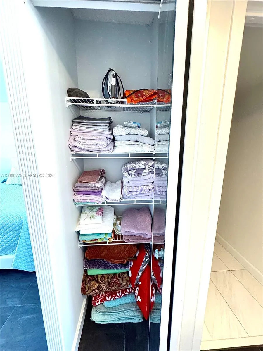 Third closet in bedroom, could be used for linens Third closet in bedroom, could be used for linens