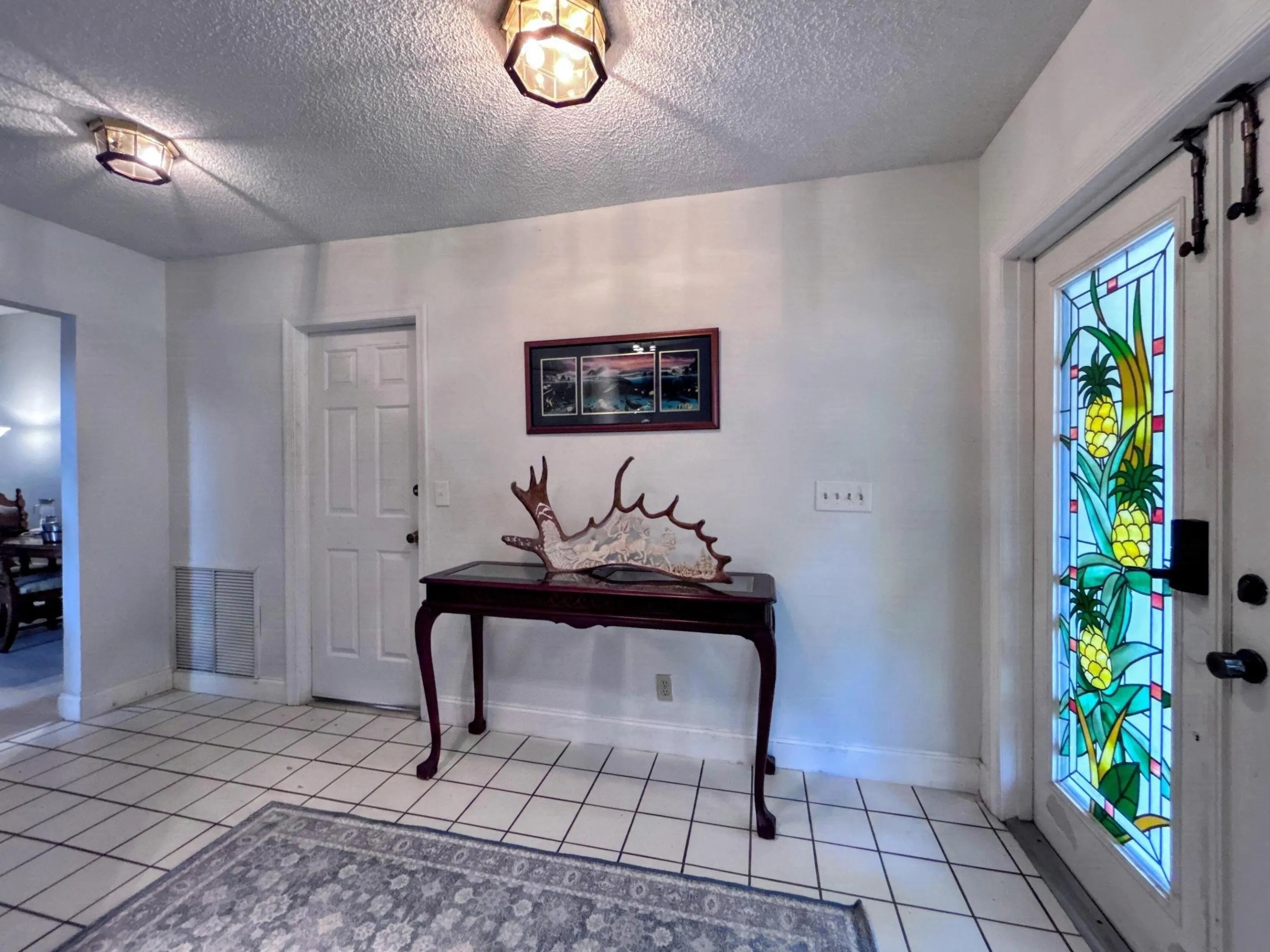 Front foyer w/door to 2-car garage