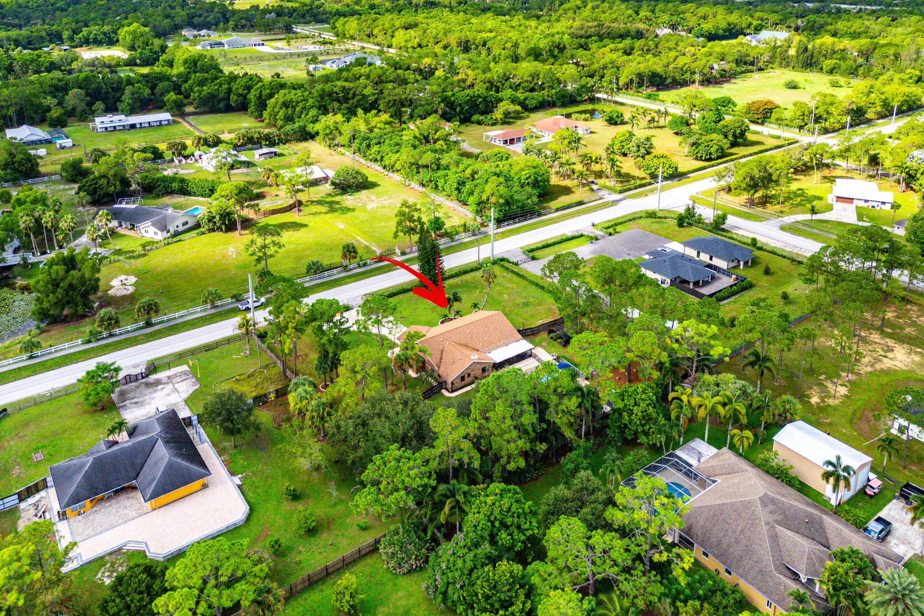 052-18429SycamoreDriveWest-TheAcreage-FL