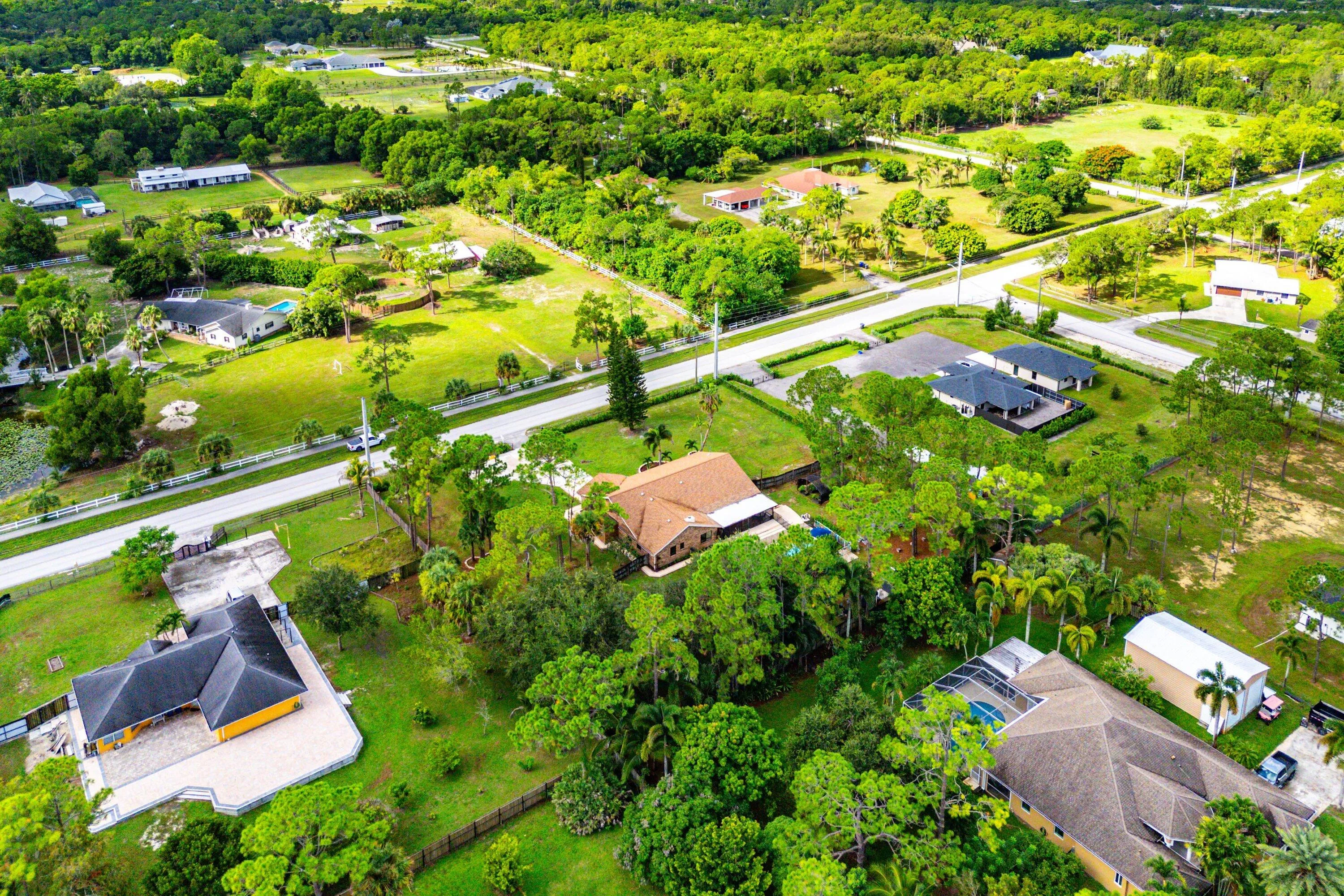 053-18429SycamoreDriveWest-TheAcreage-FL